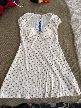 Cider Cream Knit piuntelle Dress with Pink Floral Accents